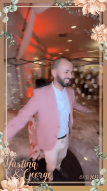 Man in suit enjoying 360 photo booth